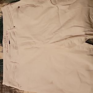 Ladies white skimmer Bermuda length shorts